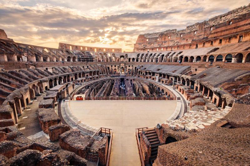 Scenic view of Roman Colosseum interior at sunset