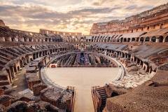 Scenic view of Roman Colosseum interior at sunset