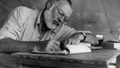 Ernest Hemingway Writing at Campsite in Kenya NARA